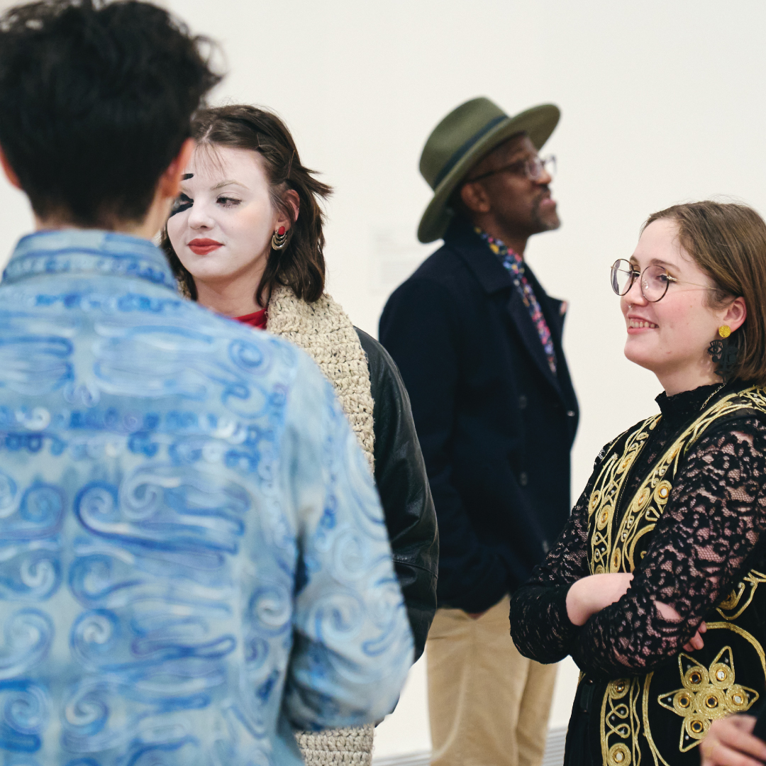 Visitors attending a reception at the Rose Art Museum