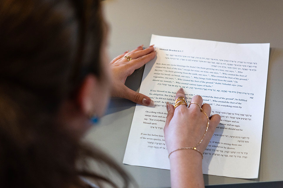 A student reads a document.